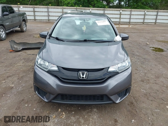 2015 Honda Fit LX z VIN 3HGGK5H59FM714352, wystawiony jako IAAI lot #42156097 z przebiegiem 103 587 mil mil oraz . Historia ofert i sprzedaży dostępna na DreamBid. Obrazek 12.