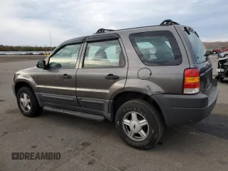 2004 Ford Escape XLS with VIN 1FMYU92184KA91008, listed as a Copart auction lot 80793134 with 159,429 mi miles and Salvage Title. Bid and sale history available at DreamBid. Image 2.