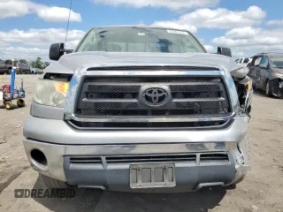 2012 Toyota Tundra 4WD Truck with VIN 5TFCY5F15CX013941, listed as a Copart auction lot 69946754 with 163,228 mi miles and Salvage Title. Bid and sale history available at carsss.com. Image 5.