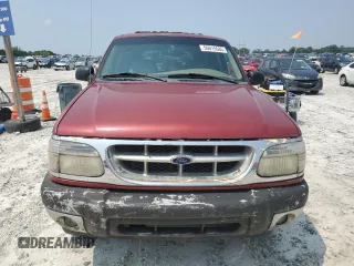 2000 Ford Explorer XLT with VIN 1FMZU73E4YZA72348, listed as a Copart auction lot 59015585 with 182,606 mi miles and Salvage title. Bid and sale history available at DreamBid. Image 5.