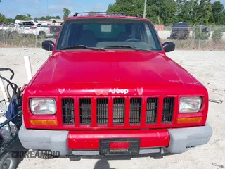 2001 Jeep Cherokee Sport z VIN 1J4FT48S01L508039, wystawiony jako IAAI lot #42743009 z przebiegiem 200 074 mil mil oraz . Historia ofert i sprzedaży dostępna na DreamBid. Obrazek 6.