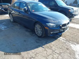 2014 BMW 3 Series 328i z VIN WBA3A5C57EP601755, wystawiony jako IAAI lot #41409596 z przebiegiem 77 117 mil mil oraz . Historia ofert i sprzedaży dostępna na DreamBid. Obrazek 1.