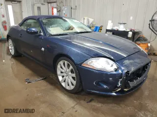 2007 Jaguar XK with VIN SAJDA44BX75B00447, listed as a Copart auction lot 50147695 with 119,467 mi miles and Salvage Title. Bid and sale history available at carsss.com. Image 4.