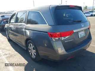 2015 Honda Odyssey EX-L with VIN 5FNRL5H61FB126933, listed as a IAAI auction lot 42003978 with 69,025 mi miles and . Bid and sale history available at carsss.com. Image 3.