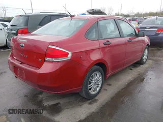 2009 Ford Focus SE with VIN 1FAHP35N09W136732, listed as a IAAI auction lot 42061783 with 143,993 mi miles. Bid and sale history available at carsss.com. Image 4.