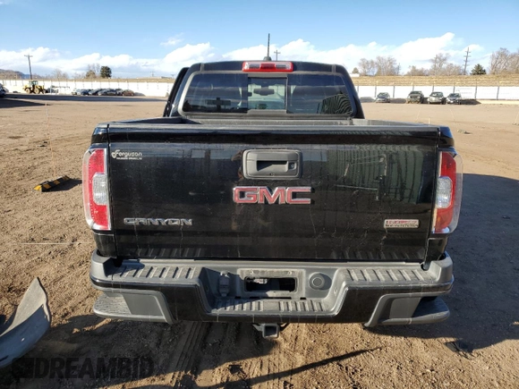 2017 GMC Canyon 4WD SLE with VIN 1GTG6CENXH1254503, listed as a Copart auction lot 46796135 with 80,458 mi miles and Salvage Title. Bid and sale history available at carsss.com. Image 6.