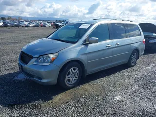 2007 Honda Odyssey EX with VIN 5FNRL38457B141956, listed as a IAAI auction lot 41818619 with 160,649 mi miles. Bid and sale history available at carsss.com. Image 2.