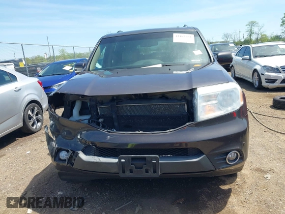 2012 Honda Pilot Touring with VIN 5FNYF4H9XCB083406, listed as a IAAI auction lot 42107651 with 217,678 mi miles. Bid and sale history available at carsss.com. Image 13.