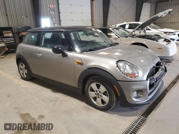 2017 MINI Hardtop Cooper with VIN WMWXP5C30H2F60940, listed as a Copart auction lot 56475935 with 66,925 mi miles and Salvage title. Bid and sale history available at DreamBid. Image 4.