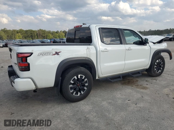 2023 Nissan Frontier Pro-X with VIN 1N6ED1EJ6PN661933, listed as a Copart auction lot 52496135 with 28,533 mi miles and Salvage title. Bid and sale history available at DreamBid. Image 3.