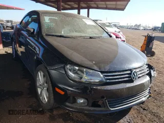 2014 Volkswagen Eos Komfort with VIN WVWBW8AH3EV001812, listed as a IAAI auction lot 40885305 with 66,347 mi miles and . Bid and sale history available at DreamBid. Image 1.