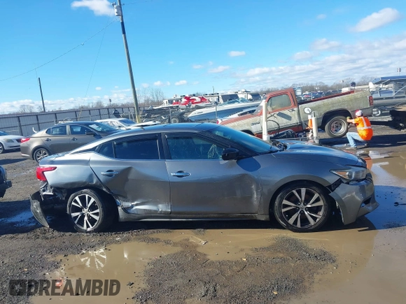 2016 Nissan Maxima Platinum with VIN 1N4AA6AP7GC409949, listed as a IAAI auction lot 41214746 with 190,853 mi miles and . Bid and sale history available at DreamBid. Image 13.