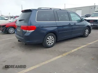2010 Honda Odyssey EX-L with VIN 5FNRL3H68AB043450, listed as a IAAI auction lot 41912223 with 199,855 mi miles. Bid and sale history available at carsss.com. Image 4.