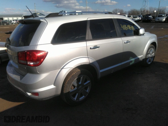 2014 Dodge Journey Limited with VIN 3C4PDCDG9ET157841, listed as a IAAI auction lot 41609646 with 130,329 mi miles and . Bid and sale history available at DreamBid. Image 4.