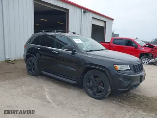2014 Jeep Grand Cherokee Overland with VIN 1C4RJFCM8EC486259, listed as a IAAI auction lot 42105296 with 129,342 mi miles. Bid and sale history available at carsss.com. Image 1.