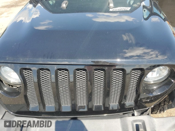 2020 Jeep Wrangler Sport with VIN 1C4GJXAG9LW203468, listed as a Copart auction lot 63586585 with 58,180 mi miles and Salvage title. Bid and sale history available at DreamBid. Image 12.
