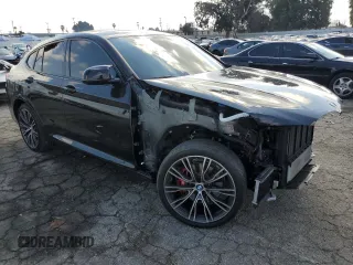 2023 BMW X4 M40i with VIN 5UX43DT0XP9R99758, listed as a Copart auction lot 44651255 with 20,105 mi miles and Salvage Title. Bid and sale history available at carsss.com. Image 4.