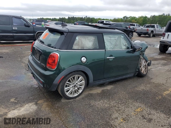 2015 MINI Hardtop S with VIN WMWXP7C59F2A42464, listed as a Copart auction lot 52101705 with Not Provided miles and Salvage Title. Bid and sale history available at DreamBid. Image 3.