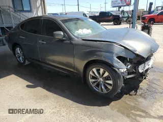 2013 Infiniti M with VIN JN1BY1APXDM510926, listed as a Copart auction lot 51700125 with 111,045 mi miles and Salvage title. Bid and sale history available at DreamBid. Image 4.