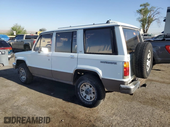 1990 Isuzu Trooper с VIN JACCH58R2L8912963, выставлен на аукционе Copart как лот 53236865 с пробегом 206 634 миль миль и Чистый • Clean title. История ставок и продаж доступна на DreamBid. Изображение 2.