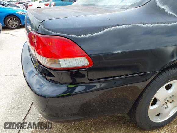 2001 Honda Accord EX z VIN 1HGCG16571A046374, wystawiony jako IAAI lot #42210342 z przebiegiem 184 261 mil mil oraz . Historia ofert i sprzedaży dostępna na DreamBid. Obrazek 6.