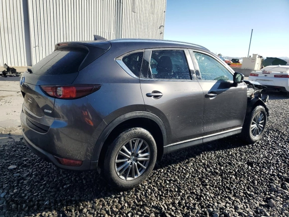 2017 Mazda CX-5 Touring with VIN JM3KFBCL2H0204097, listed as a Copart auction lot 88173195 with 76,884 mi miles and Salvage Title. Bid and sale history available at carsss.com. Image 3.