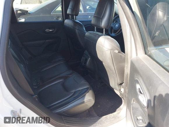 2016 Jeep Cherokee Limited with VIN 1C4PJLDB8GW256788, listed as a IAAI auction lot 41657339 with 104,630 mi miles. Bid and sale history available at carsss.com. Image 8.