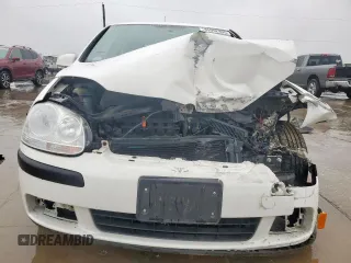 2009 Volkswagen Rabbit S with VIN WVWBA71K99W005299, listed as a Copart auction lot 45952935 with 70,833 mi miles and Salvage Title. Bid and sale history available at carsss.com. Image 5.