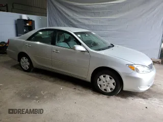 2003 Toyota Camry LE with VIN 4T1BE32K33U710903, listed as a Copart auction lot 56976585 with 157,444 mi miles and Clean Title. Bid and sale history available at DreamBid. Image 4.