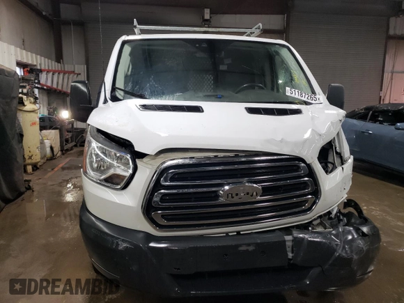 2018 Ford Transit z VIN 1FTYR1YM5JKA58794, wystawiony jako Copart lot #51187265 z przebiegiem 121 489 mil mil oraz Szkoda całkowita • Salvage title. Historia ofert i sprzedaży dostępna na DreamBid. Obrazek 5.