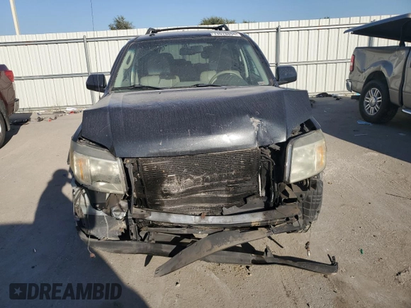2009 Mercury Mariner Premier with VIN 4M2CU87779KJ07545, listed as a Copart auction lot 74078894 with 0 mi miles and Salvage Title. Bid and sale history available at carsss.com. Image 5.