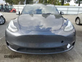 2021 Tesla Model Y Long Range with VIN 5YJYGDEE6MF200883, listed as a Copart auction lot 51707405 with 59,820 mi miles and Salvage Title. Bid and sale history available at DreamBid. Image 11.