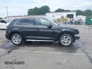 2018 Audi Q5 Premium Plus z VIN WA1BNAFY6J2100245, wystawiony jako IAAI lot #42295572 z przebiegiem 73 731 mil mil oraz . Historia ofert i sprzedaży dostępna na DreamBid. Obrazek 13.