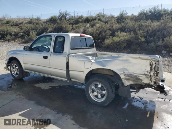 2002 Toyota Tacoma z VIN 5TEVL52N72Z007081, wystawiony jako Copart lot #52008995 z przebiegiem 218 910 mil mil oraz Szkoda całkowita • Salvage title. Historia ofert i sprzedaży dostępna na DreamBid. Obrazek 2.