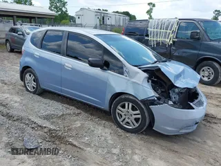 2009 Honda Fit z VIN JHMGE87279S039917, wystawiony jako IAAI lot #42254125 z przebiegiem 187 266 mil mil oraz . Historia ofert i sprzedaży dostępna na DreamBid. Obrazek 1.