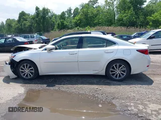 2016 Lexus ES 300h z VIN JTHBW1GG8G2110372, wystawiony jako IAAI lot #42278981 z przebiegiem 140 963 mil mil oraz . Historia ofert i sprzedaży dostępna na DreamBid. Obrazek 14.