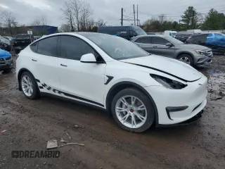 2020 Tesla Model Y Long Range with VIN 5YJYGDEE2LF019133, listed as a Copart auction lot 51773455 with 26,122 mi miles and Salvage Title. Bid and sale history available at DreamBid. Image 4.
