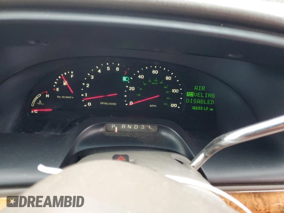2001 Lincoln Continental z VIN 1LNHM97V41Y633841, wystawiony jako Copart lot #86695664 z przebiegiem 166 931 mil mil oraz Szkoda całkowita • Salvage title. Historia ofert i sprzedaży dostępna na DreamBid. Obrazek 9.