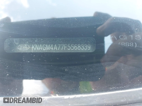 2015 Kia Optima LX with VIN KNAGM4A77F5568339, listed as a IAAI auction lot 42695740 with 135,632 mi miles and . Bid and sale history available at DreamBid. Image 9.