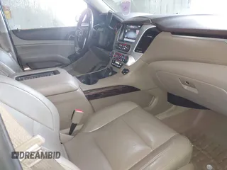 2015 GMC Yukon XL SLT with VIN 1GKS2HKC6FR667110, listed as a IAAI auction lot 41472250 with 141,383 mi miles. Bid and sale history available at carsss.com. Image 5.
