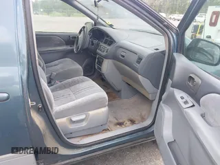 2002 Toyota Sienna LE z VIN 4T3ZF13C52U437850, wystawiony jako IAAI lot #42495616 z przebiegiem 225 330 mil mil oraz . Historia ofert i sprzedaży dostępna na DreamBid. Obrazek 5.