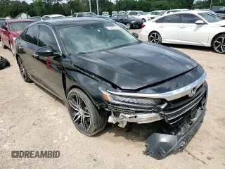2021 Honda Accord Touring z VIN 1HGCV2F9XMA001495, wystawiony jako Copart lot #55408325 z przebiegiem 130 886 mil mil oraz Szkoda całkowita • Salvage title. Historia ofert i sprzedaży dostępna na DreamBid. Obrazek 13.