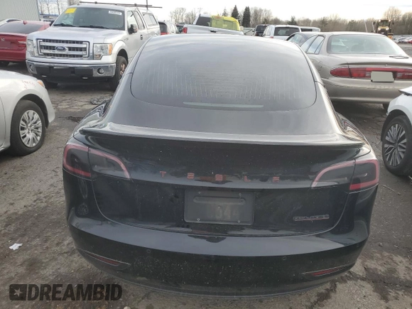 2019 Tesla Model 3 Long Range with VIN 5YJ3E1EB9KF440365, listed as a Copart auction lot 83839034 with 74,667 mi miles and Salvage Title. Bid and sale history available at DreamBid. Image 6.