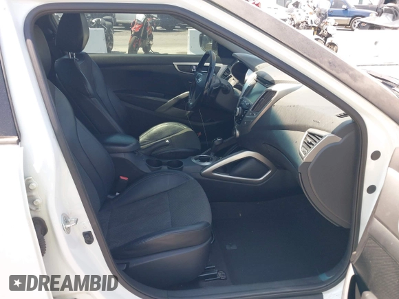 2013 Hyundai Veloster w/Black Int with VIN KMHTC6AD8DU174885, listed as a IAAI auction lot 42408175 with 132,366 mi miles and . Bid and sale history available at DreamBid. Image 5.