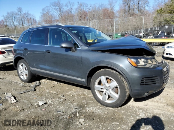 2012 Volkswagen Touareg Lux с VIN WVGEK9BP1CD008132, выставлен на аукционе Copart как лот 49501765 с пробегом 156 594 миль миль и Списание • Salvage title. История ставок и продаж доступна на DreamBid. Изображение 4.