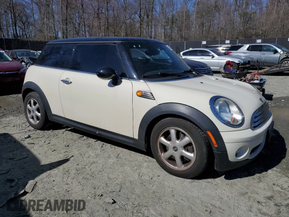 2008 MINI Hardtop with VIN WMWMF33508TT66699, listed as a Copart auction lot 48233985 with 88,817 mi miles and Salvage Title. Bid and sale history available at DreamBid. Image 4.