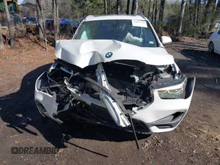 2022 BMW X1 xDrive28i z VIN WBXJG9C04N5V16794, wystawiony jako IAAI lot #41667535 z przebiegiem 55 747 mil mil oraz . Historia ofert i sprzedaży dostępna na DreamBid. Obrazek 12.