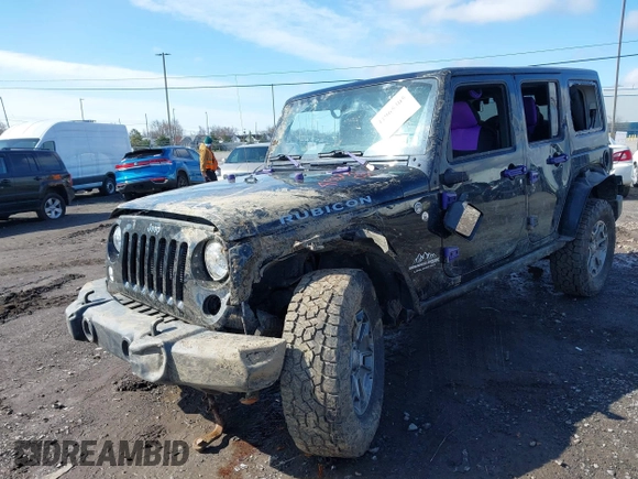 2018 Jeep Wrangler Unlimited Rubicon Recon with VIN 1C4HJWFG1JL915740, listed as a IAAI auction lot 41965305 with 73,035 mi miles and . Bid and sale history available at DreamBid. Image 2.