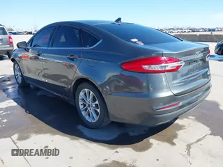 2020 Ford Fusion SE with VIN 3FA6P0HD3LR136288, listed as a IAAI auction lot 41699942 with 99,409 mi miles. Bid and sale history available at carsss.com. Image 3.