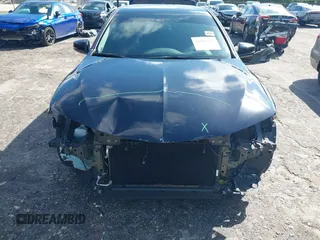 2020 Acura TLX w/Technology Pkg with VIN 19UUB1F57LA016345, listed as a IAAI auction lot 41661004 with 66,501 mi miles. Bid and sale history available at carsss.com. Image 6.